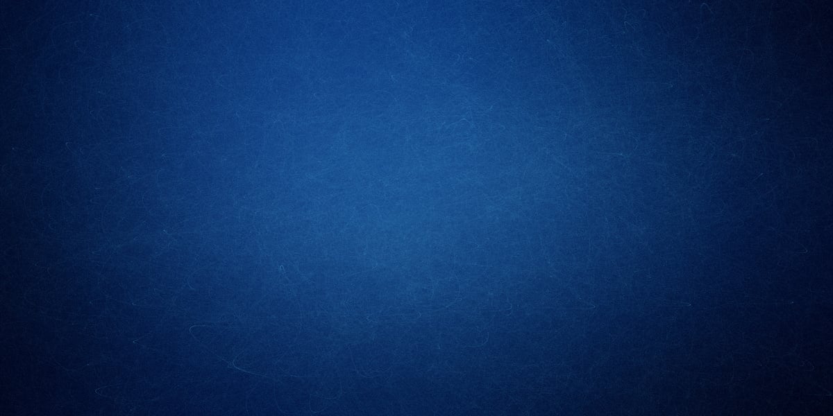 Texture of old navy blue paper closeup